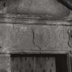 Detail of inscription above door at old house.