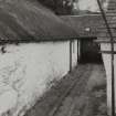 Edradour Distillery.
General view of wooden guide rails for rolling casks.