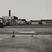 General view from SW of buildings of E side of Bottling Plant complex, including (L to R), Cased Goods Store, Boiler House, Bottling Hall, Offices and Canteen
Photographed 27 January 1994
