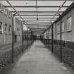 View from NW under glass canopy of walkway between Office Buildings and the Bottling Hall
Photographed 27 January 1994