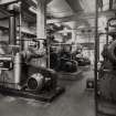 Attemperation Plant: View of compressors used in Glycerol-based cooling system designed to prevent natural haze appearing in bottled whisky (3 electrically-powered J & E Hall Ltd of Dartford compressor units, and Glycerol and hot water tanks to rear).
Photographed 27 January 1994