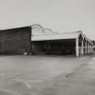 View from N of vaulted canopy and NW frontage of Empty Bottle Store, adjacent to Bottling Hall.
Photographed 27 January 1994