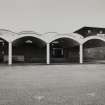 View from NW of vaulted canopy and NW frontage of Empty Bottle Store, adjacent to Bottling Hall.
Photographed 27 January 1994