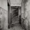 Orchil House, interior.
View of first floor stone service stair from East.