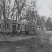 E/W Track. View of huts from NE