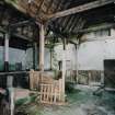 Interior. View of main byre showing roof structure and stalls