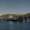 View from W of Isle of Rhum ferry moored at the Scalpay side, prior to moving into position to receive cars and foot passengers