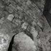 Interior, tower, second floor, main hall, arched doorway with corbel course above, detail.