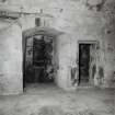 Interior, tower, second floor, South wing, vaulted chamber, view of South West window in vaulted recess next to doorway.