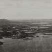 Copy of historic photograph showing aerial view of Lochmaddy from SSW.