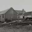 Farmhouse and former shop, view from NW