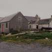 Farmhouse and former shop, view from NW