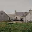 Farmhouse and former shop, view from W