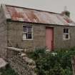 Corrugated-roofed building to SW of farmhouse, view from SE