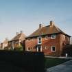 View from W of detached Officers' houses at SW end of Rosetrees Lane (NY 348 672)