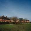 General view from SW of row of detached Officers' houses in Rosetrees Lane (NY 349 673)