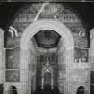 Interior. General view of mural on chancel arch depicting the Multitude of the Redeemed, the Perfected Church,  the Holy Angels, the Four Great Cherubim and the Four Evangelist symbols