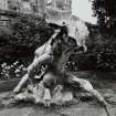 Lead sculpture by Charles Mackie in garden to South of main house, view from South West.