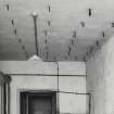 Edinburgh, Frogston Road East, Mortonhall, interior.
View of the basement, the ceiling having many meat-hooks in rows.
