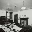 Edinburgh, 87 Giles Street, The Black Vaults, interior.
View of the first floor, West central room, The Director's Office, a large room with two windows, black fire surround, built in sink cabinet, and a large desk.