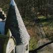 View from roof showing entrance road, window pediment and turret