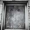 Edinburgh, 8-10 Gloucester Street.
Detail of the door of No.10, with double peep-holes cut into the shutter.