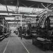 Interior.  General view in Broadloom Department between rows of looms