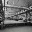 Interior.  General view of large finishing tables in paper trade products area, previously part of the Broadloom Department