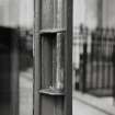 Grosvenor Street, telephone kiosks.
Detail of door handle.