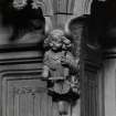 Thistle Chapel. Interior. Detail of carved angel playing violin, to west of main door