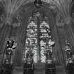 Thistle Chapel. Interior. View of crests with stained glass window behind