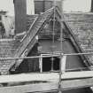 View of gabled outshot on Fourth Floor, showing timber cladding at apex and remains of cut-out barge-board