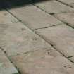Courtyard. Detail of numbered flagstones