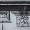 Detail of inscription above West bay window on South facade