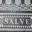 Interior-detail of tiled flooring in entrance hall, reading "SALVE"