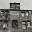 Edinburgh, 73-91 Holyrood Road.
View of upper building showing sculptured panel.