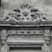 N facade. Detail showing carved pediment