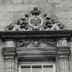 N facade. Detail showing carved pediment