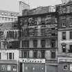 29 - 33 Leith Street
View of North West front showing boarded up shops and political posters