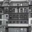 17 - 21 Leith Street
General view of North West front, showing boarded up shops and advertising posters