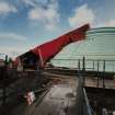 View of old copper skin of Usher Hall, and specially designed moving canopy beneath which work is done.