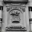 Detail of carved panel in facade of 8 Maritime Street