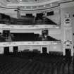Interior. Auditorium, view showing stalls, grand circle and upper circle from grand circle box to S