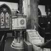 Interior detailed view of St Peter's Church showing the pulpit.