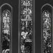 Detail of stained glass in North transept by Oscar Paterson depicting the Nativity 1912