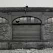 Edinburgh, Newhaven Fishmarket.
Detail of exterior of door in bay of building.