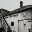 Exterior view of side of bakery from E