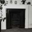 Detail of typical fireplace on first floor above bakery shop