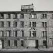 Newhaven Road, Bonnington Tannery (former).
View of South West elevation of South block, with top of water tower visible to rear.  Lettering on fascia, 'E. Chalmers & Co. Ltd.'.
