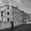 Newhaven, Fishermen's Hall, 56-58 Main Street, and 12 Pier Place.
View from South West of West end of Main Street, showing 1-8 Main Street prior to redevelopment.
